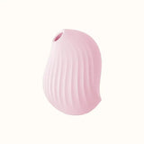 A compact, pink, ergonomic clit stimulator device designed for pleasure, with a smooth surface and body-safe silicone